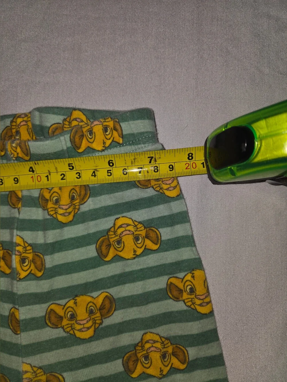 Disney Green Striped Pajama Bottoms with Yellow Character Faces